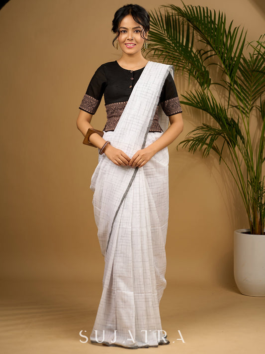 Trendy combination of black cotton ajrakh blouse and White Saree Optional