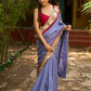 Dusty blue modal blend saree with handcrafted Madhubani border and artistic finesse