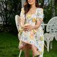 Luminous White Cotton Floral Dress with Square Neck, Contrasting Pink Accents, Flared Silhouette & Voluminous Puffy Sleeves