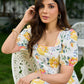 Luminous White Cotton Floral Dress with Square Neck, Contrasting Pink Accents, Flared Silhouette & Voluminous Puffy Sleeves