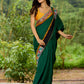 Artisanal cotton saree in bold green with Madhubani hand painted charm