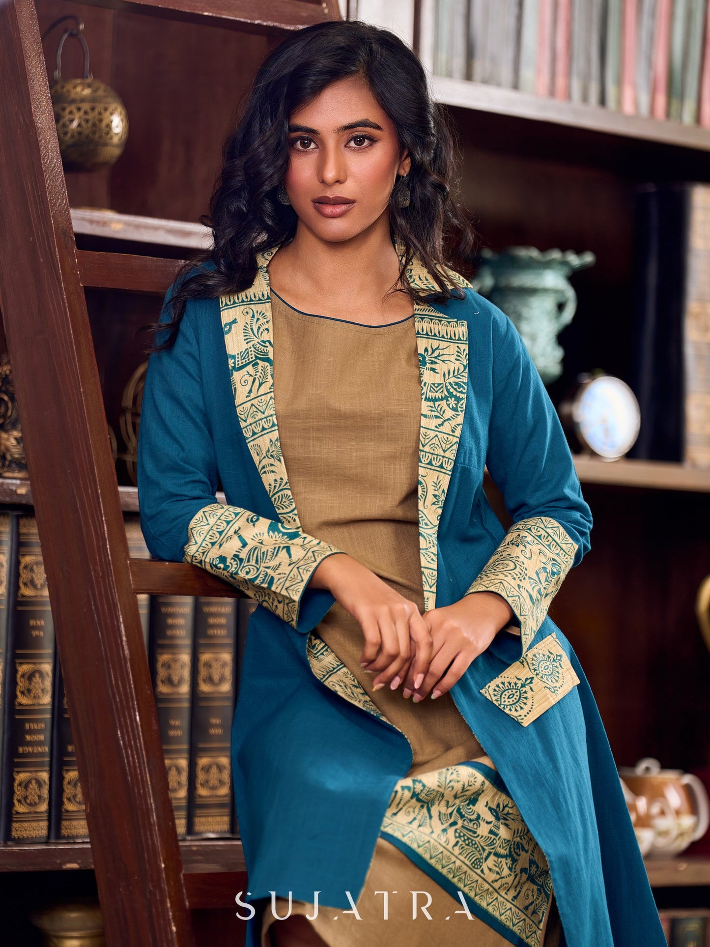Elegant Teal Cotton Long Jacket Accented with Madhubani Printed Collar, Cuffs and Pocket Flap