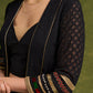 Evening Allure : Black Chikankari Long Shrug With The Sprinkle Of Red & Green Unique Embellishments