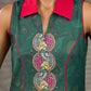 Bottle green Madhubani printed dress with vibrant magenta accents.