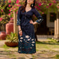 Stunning bottle green kurta adorned with a cream lotus midnight-inspired print.