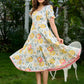 Luminous White Cotton Floral Dress with Square Neck, Contrasting Pink Accents, Flared Silhouette & Voluminous Puffy Sleeves