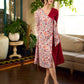 Jaipur-printed maroon floral crossover dress featuring a wrap-style silhouette with a coordinating floral tie-up, creating a flattering cinched waist and a breezy, feminine flow.