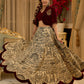 Madhubani print lehenga with a scalloped hem, paired with a rich maroon velvet blouse - Short Jacket with elegant brooch style embroidery Optional