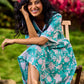 Sea Green Floral Cotton Dress with Lace-Trimmed Neckline and Puffy Sleeves