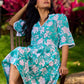 Sea Green Floral Cotton Dress with Lace-Trimmed Neckline and Puffy Sleeves