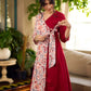 Jaipur-printed maroon floral crossover dress featuring a wrap-style silhouette with a coordinating floral tie-up, creating a flattering cinched waist and a breezy, feminine flow.