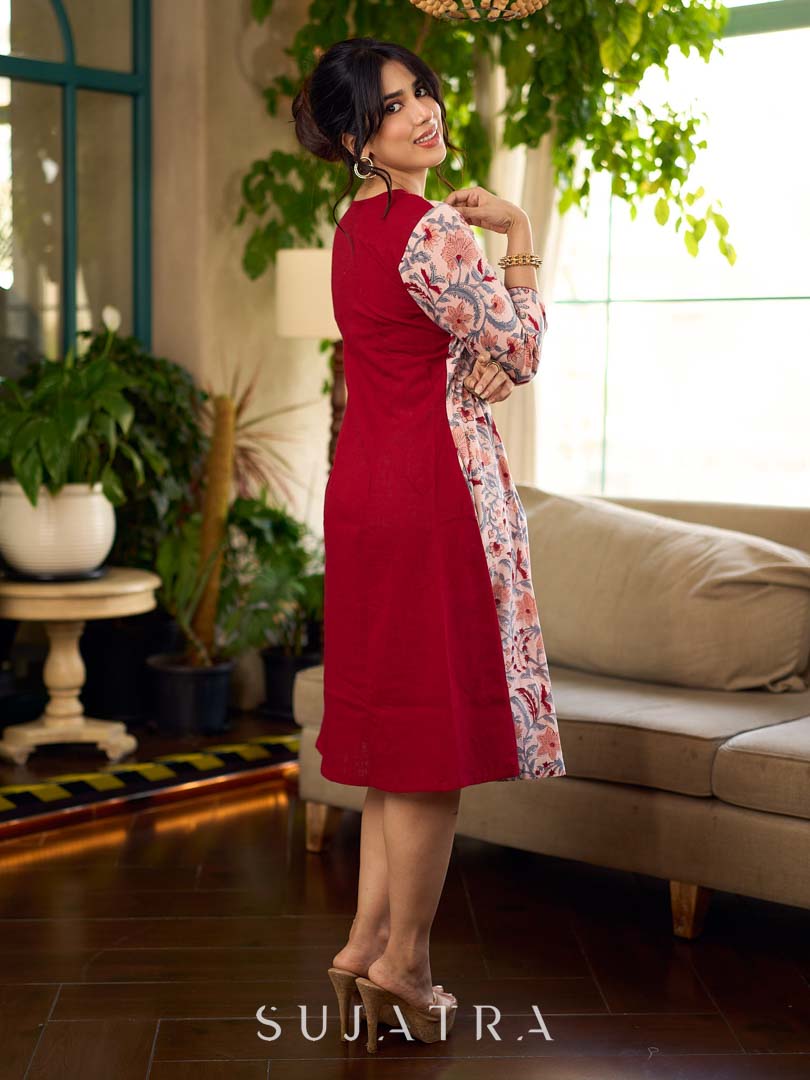 Jaipur-printed maroon floral crossover dress featuring a wrap-style silhouette with a coordinating floral tie-up, creating a flattering cinched waist and a breezy, feminine flow.