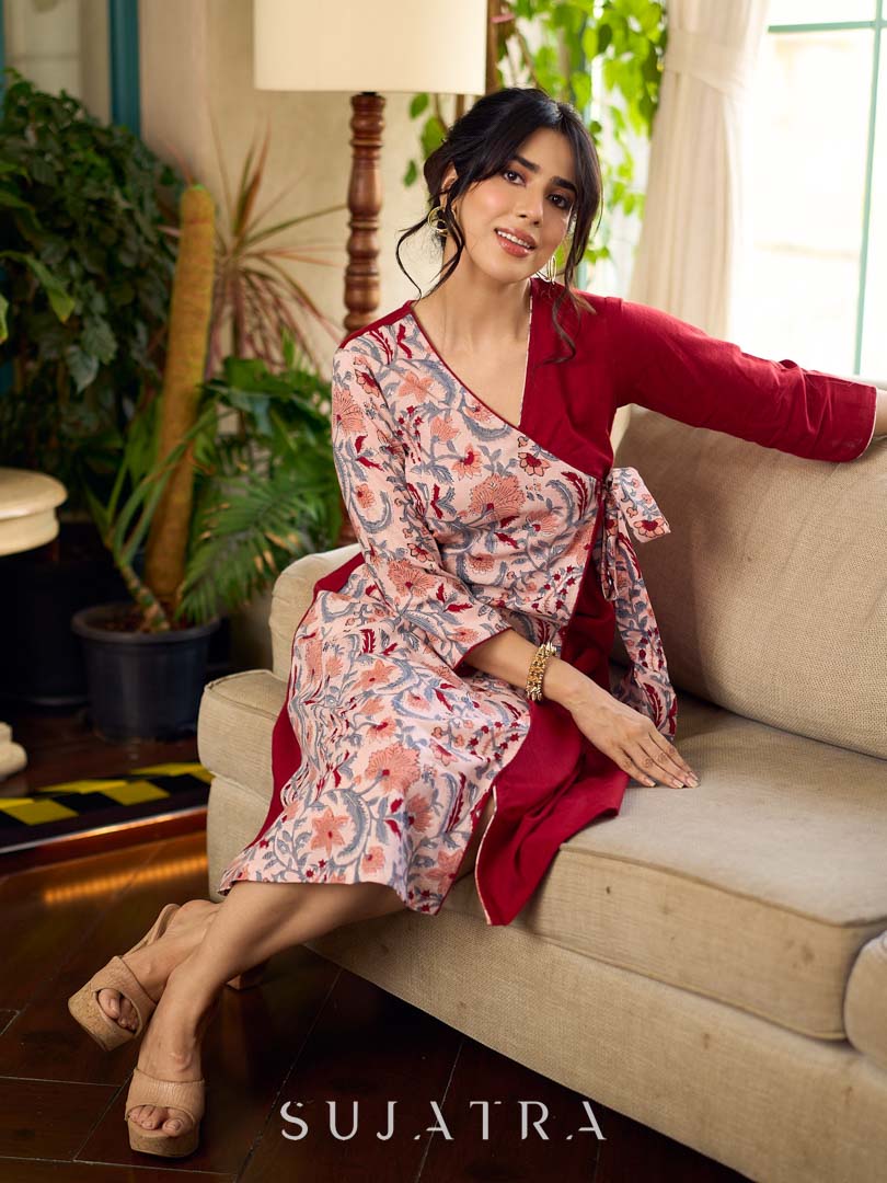 Jaipur-printed maroon floral crossover dress featuring a wrap-style silhouette with a coordinating floral tie-up, creating a flattering cinched waist and a breezy, feminine flow.