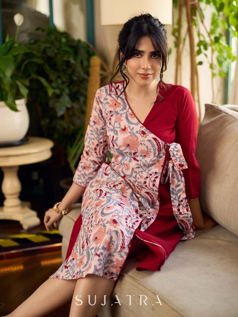 Jaipur-printed maroon floral crossover dress featuring a wrap-style silhouette with a coordinating floral tie-up, creating a flattering cinched waist and a breezy, feminine flow.