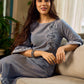 Two-tone handloom cotton dress with delicately painted Madhubani fish motifs and pleated hem.