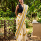 Breezy Off-White Cotton Saree with Fresh Floral Hand Block Print and Yellow Border Highlights