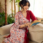 Jaipur-printed maroon floral crossover dress featuring a wrap-style silhouette with a coordinating floral tie-up, creating a flattering cinched waist and a breezy, feminine flow.