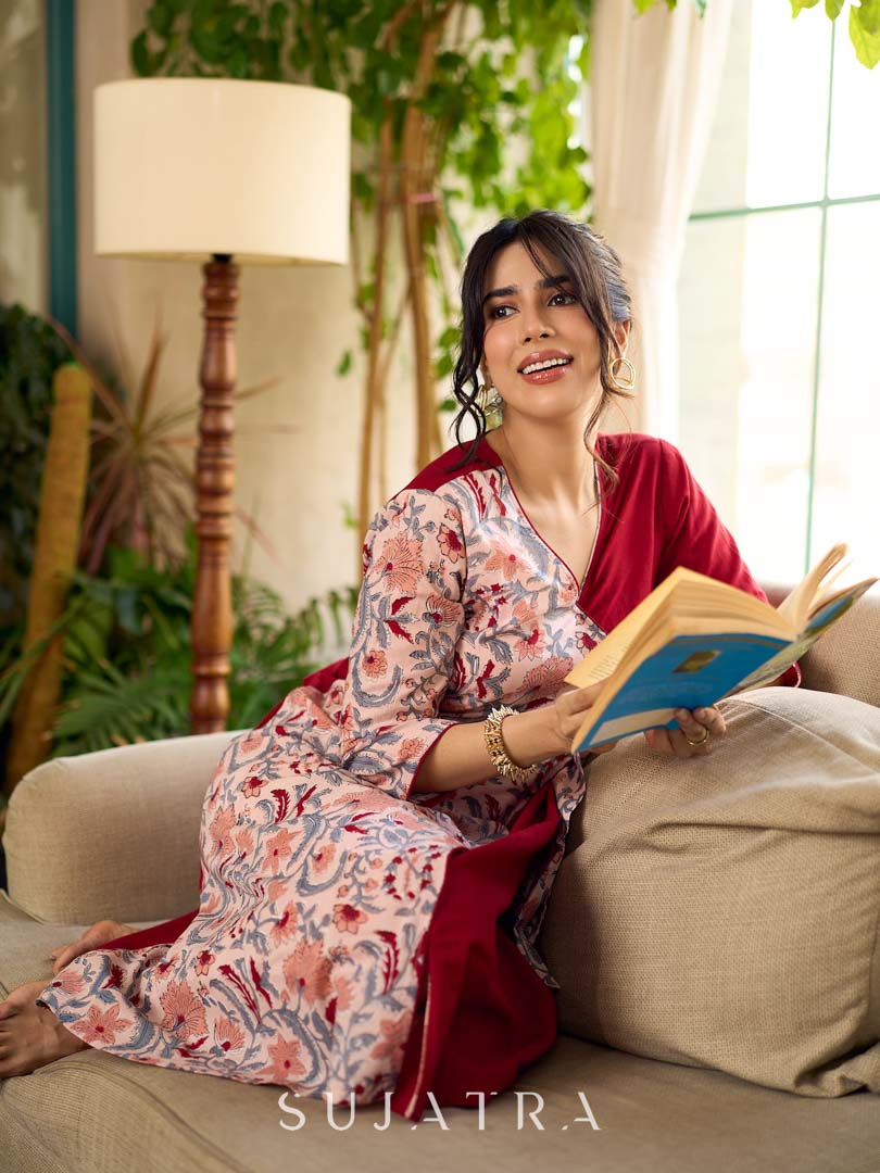 Jaipur-printed maroon floral crossover dress featuring a wrap-style silhouette with a coordinating floral tie-up, creating a flattering cinched waist and a breezy, feminine flow.
