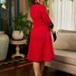 Elegant red dress featuring delicate, hand-painted Madhubani lotus motif detailing.