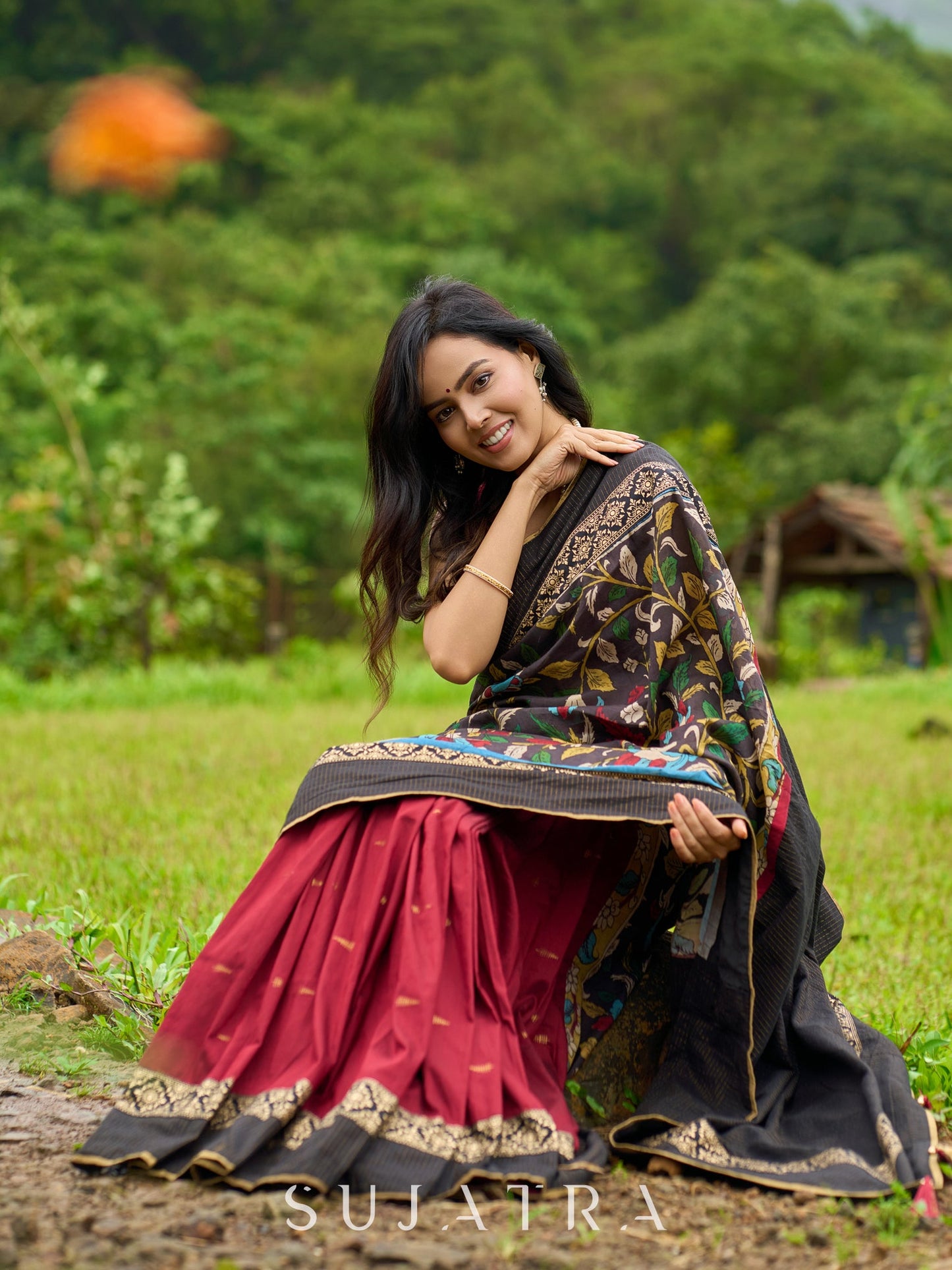 Artisanal maroon & black combination saree with hand painted Kalamkari pallu and golden borders