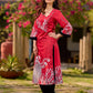 Artisanal red kurta adorned with a Kalamkari peacock motif and a striking asymmetrical neck detail