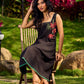 Chic Black Cotton Dress With Handcrafted Red Floral Applique And Contrast Green Detailing