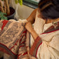 Elegant White Hakoba Cotton Saree with Rust-Red Kalamkari Print & Ajrakh Chevron Border