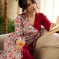 Jaipur-printed maroon floral crossover dress featuring a wrap-style silhouette with a coordinating floral tie-up, creating a flattering cinched waist and a breezy, feminine flow.