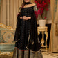 Black cotton silk & brocade lehenga paired with a sculpted corset style choli featuring intricate stonework on sleeves .