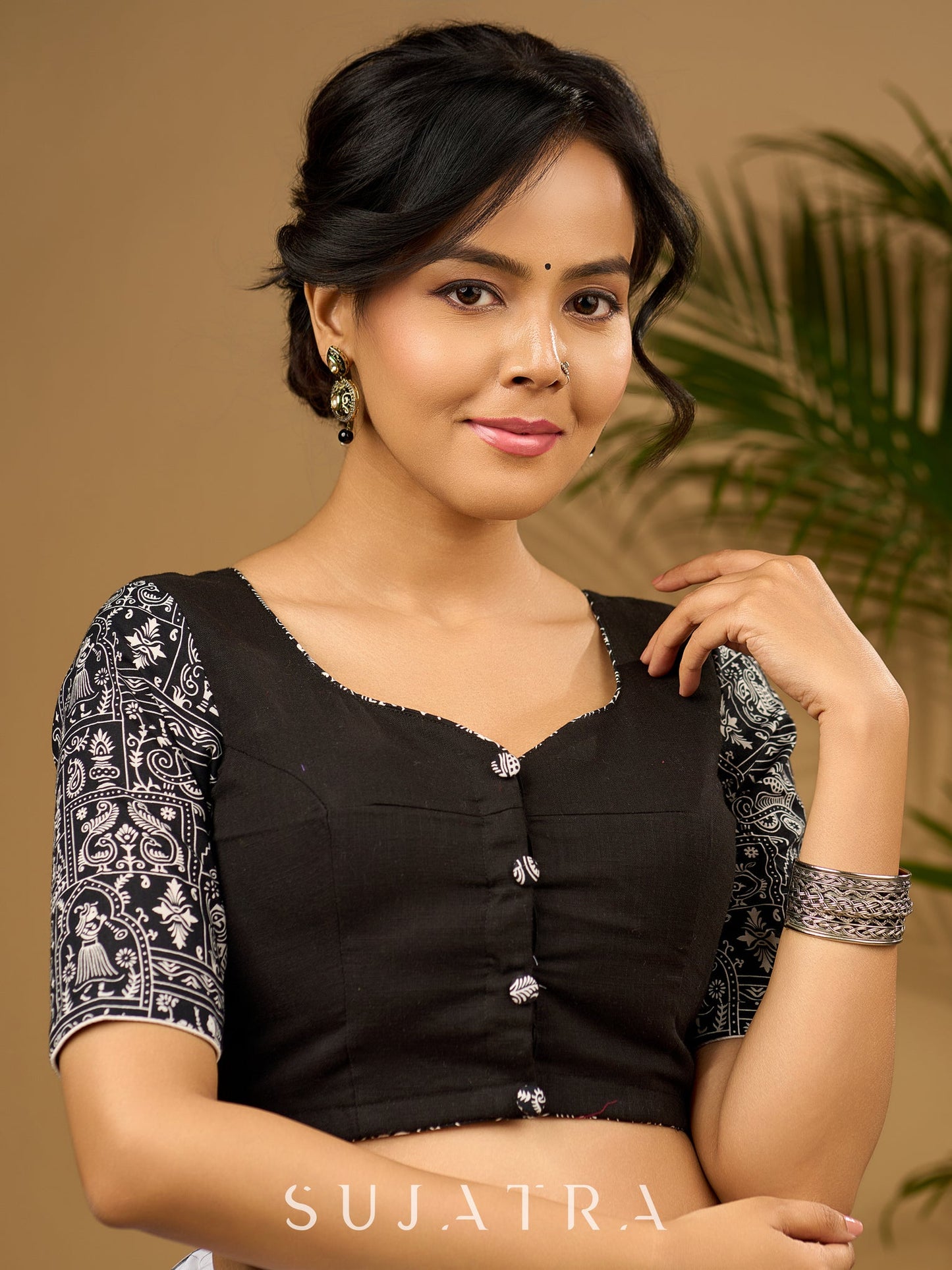 Stunning black cotton hand embroidered blouse with warli printed sleeve
