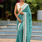Vibrant Sea Green Modal Saree with Ivory Chevron Border & Minimal Hand Embroidery