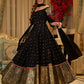 Black cotton silk & brocade lehenga paired with a sculpted corset style choli featuring intricate stonework on sleeves .