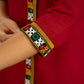 Elegant maroon cotton top featuring mirror work and side collar.