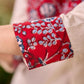 Off White Cotton Flex Apple-Cut Kurta with Red Printed Yoke and Tassel Detail