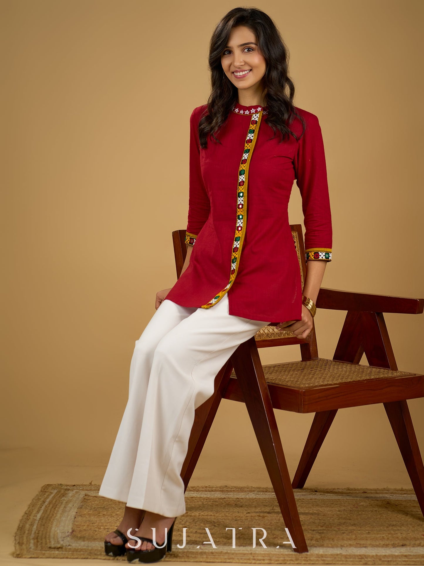 Elegant maroon cotton top featuring mirror work and side collar.