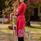 Artisanal red kurta adorned with a Kalamkari peacock motif and a striking asymmetrical neck detail