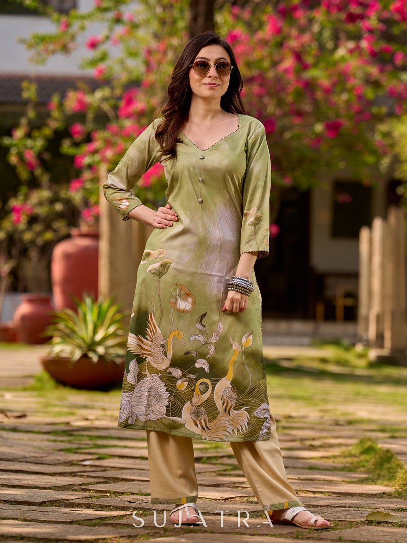 Ethereal soft green ombré kurta adorned with swan-inspired motifs