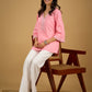 Elegant baby pink cotton top highlighted with subtle thread embroidery