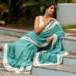 Vibrant Sea Green Modal Saree with Ivory Chevron Border & Minimal Hand Embroidery
