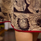 Black Heritage-inspired Kalamkari halter dress with elegant maroon contrast detailing.