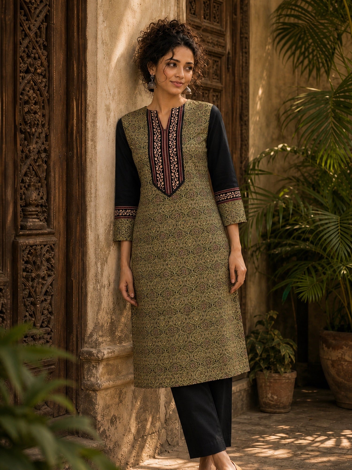 Regal Olive Ajrakh Print Kurta with Black Contrast Sleeves & Coordinated Ajrakh Border Detailing
