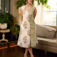 Jaipur-printed sleeveless dress featuring a half-and-half butta and jaal combination, designed with an overlapping silhouette, soft drop shoulders, and wooden accents for an artisanal, contemporary look.