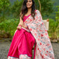Floral-inspired white saree elevated with fuchsia pleats and borders