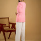 Elegant baby pink cotton top highlighted with subtle thread embroidery
