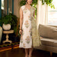 Jaipur-printed sleeveless dress featuring a half-and-half butta and jaal combination, designed with an overlapping silhouette, soft drop shoulders, and wooden accents for an artisanal, contemporary look.