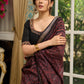 Pure Maheshwari saree with bold Ajrakh prints and regal zari border
