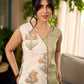 Jaipur-printed sleeveless dress featuring a half-and-half butta and jaal combination, designed with an overlapping silhouette, soft drop shoulders, and wooden accents for an artisanal, contemporary look.