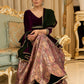 Royal Wine Lehenga with a scalloped hem and a luxurious velvet choli with Zardosi work .