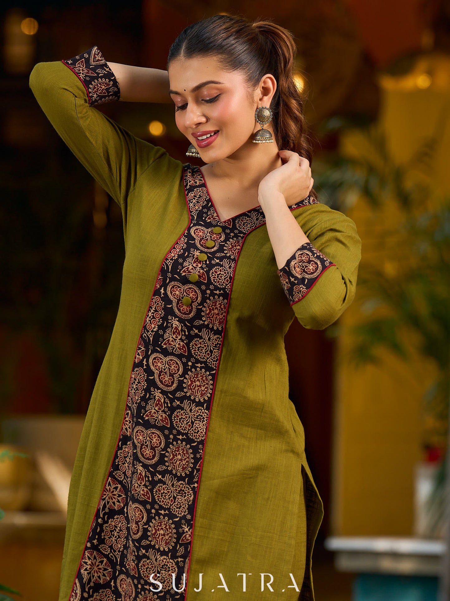 Olive kurta elevated with a black Ajrakh centre panel and Maroon details