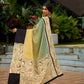 Vibrant Sage-Yellow Ombre Saree with Madhubani Print Border & Black Trim